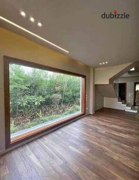 أرضي بجاردن استلام فوري متشطبة بالتكييفات والمطابخ في أرقي كمبوند بالقرب من الخمائل ونيو جيزة