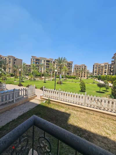 For sale in Al-Rehab City, a 214 sqm apartment on the ground floor with a private garden of 65 sqm in phase seven, first occupancy, featuring a distinctive view and wide garden.