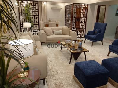 شقة فندقيه مفروشة تشطيب فندقي قرب فندق سفير ميدان المساحه للسكن الراقي والمميز بالدقي