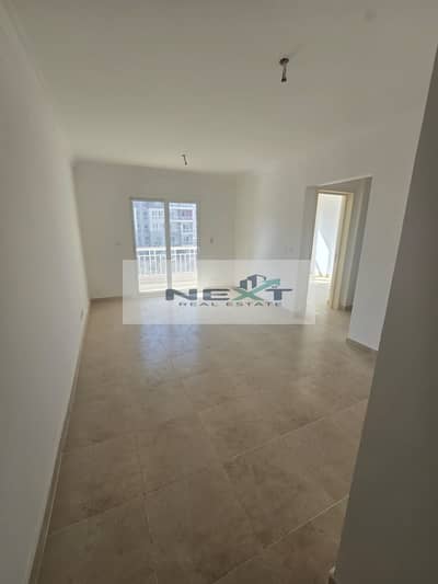 For rent in Madinaty, a new law apartment, 78 sq m, in B12, first occupancy, wide garden view, typical floor, sea view, very close to services, minute