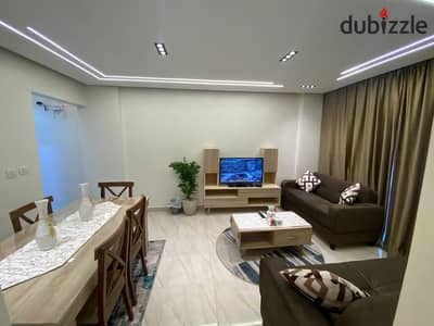 B12  Group 124, 3rd floor  Garden view    2 bedrooms, 1 bathroom  (Reception and bedrooms overlook the garden)    Super lux finishing, modern furniture and appliances, fully air-conditioned, with Wi-Fi.     For families only. Long-term rentals only.     Wha