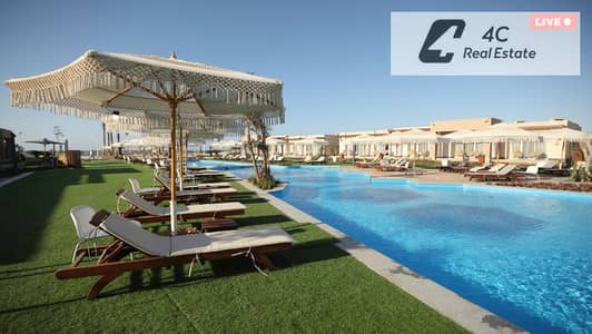 Less than market price for quick sale, penthouse chalet with complete finishes, immediate resale in Jaiya, North Coast with a special division, Open view with a down payment and installments completion without any interest.