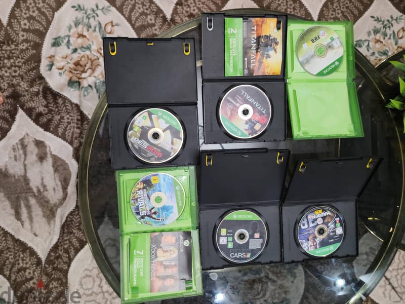 Xbox one with kinect and games. 1tb read bio قابل للفصال 12
