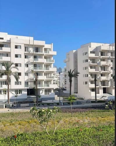 Fully finished apartment for sale in  Mazarine  – New Alamein, North Coast) with installments and a prime sea-view .