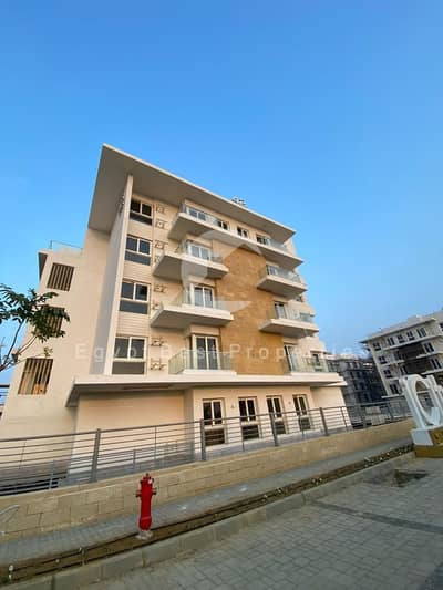 Under market price ready to move downpayment and installments prime location sky loft for sale in Mountain view Icity compound new cairo