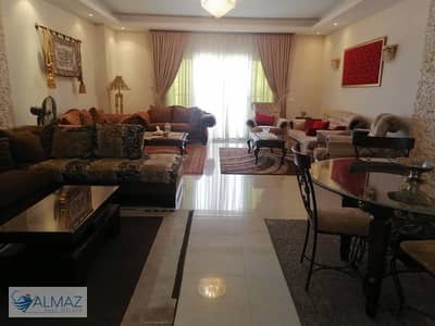Furnished 200 sq m apartment for rent in Yasmin 7 Villas, First Settlement, located near Sadat Axis and the Air Force Hospital.