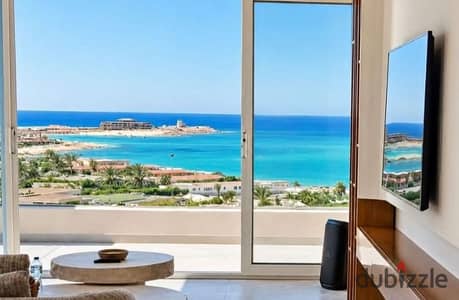 شاليه متشطب بالتكيفات علي فيو الاجون للبيع بموقع استراتيجي في سيدي حنيش بجوار بيت البحر