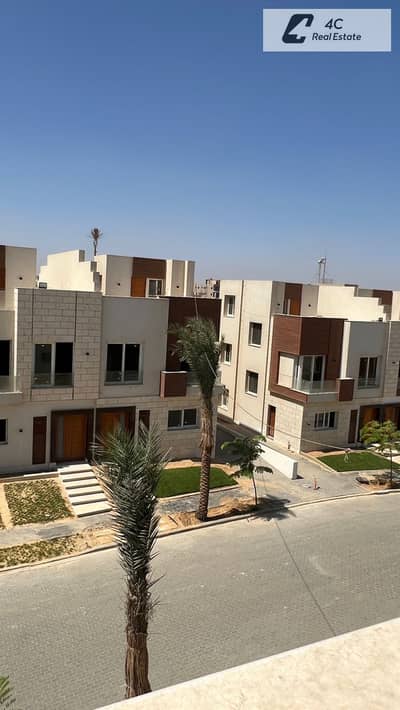 Lowest price townhouse with installments available in AZZAR 2 Compound, Fifth Settlement, with a distinctive layout, open view, ready to move