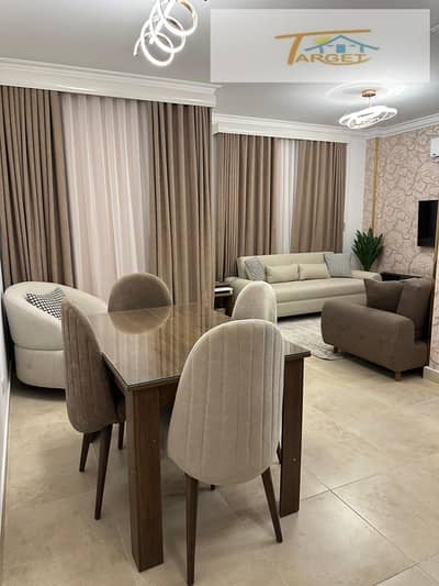 Opportunity for rent a studio on the ground floor in b12 a prime location in the newest phases of Madinaty hotel furnishings area: 67 square meters ultra super luxury finishing steps to services and the wholesale house