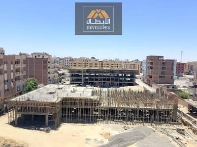 For Sale: 77 sqm apartment on Al Hijaz Main Street, Green Contract, integrated compound, 35% down payment only, 20% cash discount.