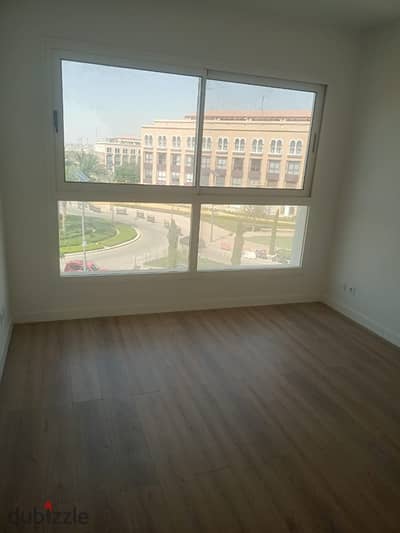 Apartment for rent in Mivida Blue Views New Cairo First residence 180 meters Second floor view part of swimming pool and main street 3 bedrooms 3 bathrooms semi-furnished required 75 thousand