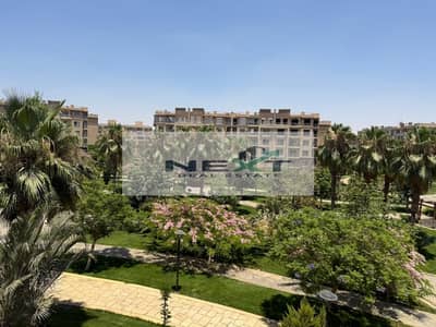 For rent in Madinaty, a new law apartment, 116 sq m, 2 bedrooms + 2 bathrooms, second floor, garden view, special finishing, minutes from services an