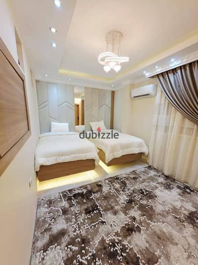 Fully furnished first-occupancy studio on Abbas El Akkad Main Street, equipped with all appliances in a prime location near malls and services.