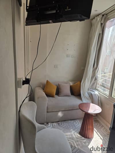 Room, hall, bathroom, and kitchen 6 October, neighborhood 2, behind the central axis, directly to neighborhood 2, block 2, steps to the parking lot and Al-Hosari and the university, steps to Mall Egypt, a third of an hour to Hyper and Zayed