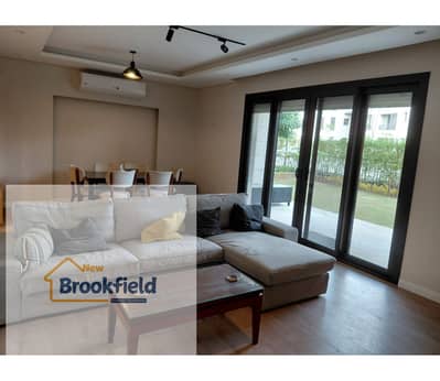 **Fully Furnished Ground Floor Apartment with Private Garden for Rent in District 5 – New Cairo**