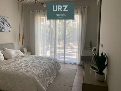 3-bed corner ground-floor apartment with private garden & entrance in the New Capita near Scene 7 Scenario Oia Green River 15-year installments