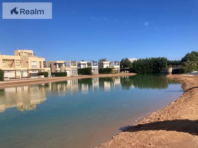 own your ready to move townhouse villa on a direct lagoon view