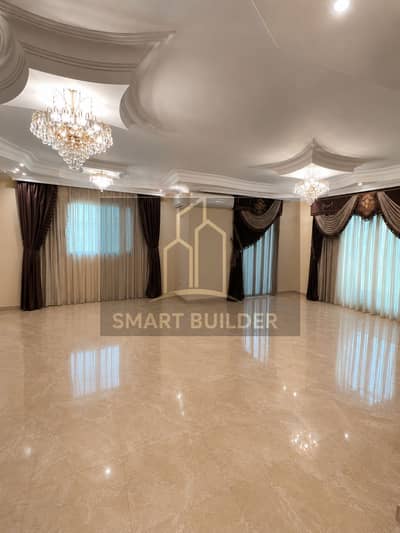Apartment for rent in Al-Nargis Villas, 3 bedrooms, 2 bathrooms, fully equipped kitchen with wood, stove, and built-in oven, reception area 3, space 203 m, first floor, Al-Nargis Villas 5, wide garden view