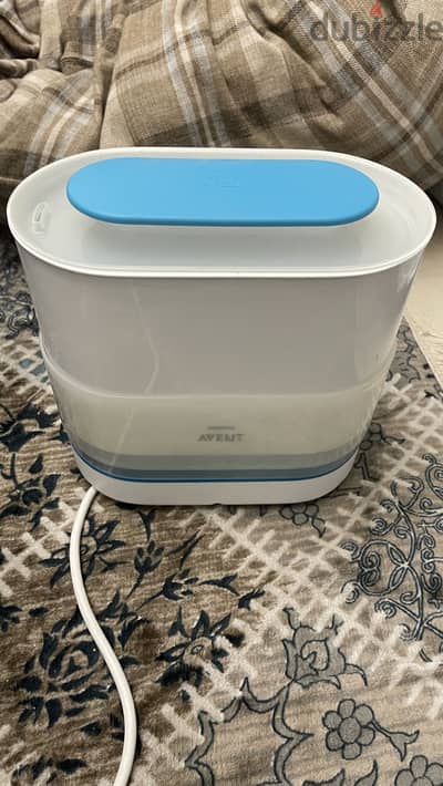 Baby bottles sterilizer (never used)