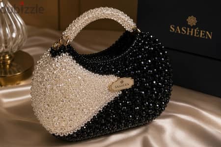 شنطه كريستال زجاجي من براند  SASHÉEN 