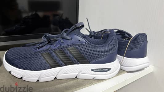 Adidas dark blue running shoes