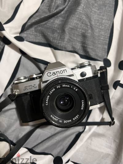 كاميرا كانون شرايط canon at1 بعدسه كانون اصلي 35mm 1:2.8