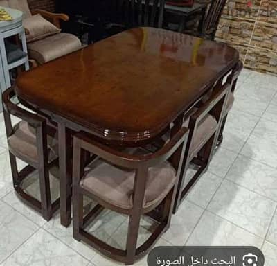 طاوله مع اربع كراسي