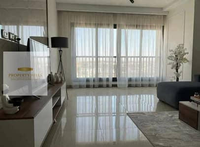 شقة علي لاجون بخصم مميزمتشطبة بالكامل للبيع في بالم هيلز التجمع palm hills new cairo