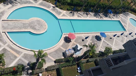 Studio in Porto Golf Marina North Coast with air-conditioned bedrooms, air-conditioned reception, and kitchen with direct access to swimming pool.