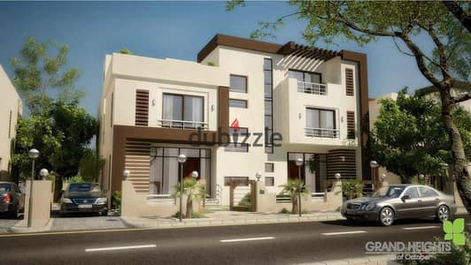 Townhouse for sale, fully finished, in a prime location with an elegant view in the heart of Sheikh Zayed City – Grand Heights Compound.