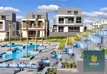 Penthouse for sale in Al-Shorouk (La Vista El Patio Oro compound), ready for viewing, featuring views of swimming pools and landscaped areas, with the