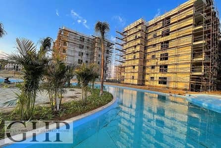 Facing north Apartment Prime location on lagoon  for Sale in Palm Hills New Cairo
