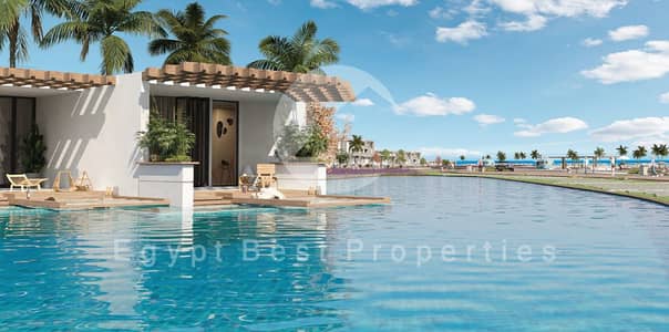Ready to move chalet for sale in Direction White, Ras El Hekma with Crystal Lagoon view and private beach access, 10% down payment over 8 years