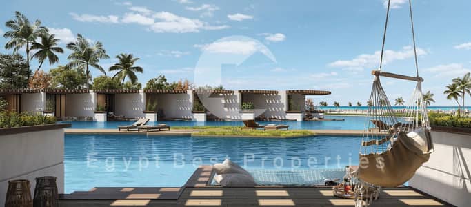 Own a fully finished chalet in Direction White North Coast now, next to InterContinental Hotel, 2BR, lagoon view, only 10% down payment, 8 years