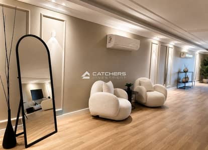 Double-view apartment with a distinctive view overlooking the Clubhouse, featuring ultra super deluxe finishing in Mayan Compound, New Cairo