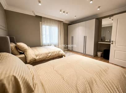 Double-view apartment with a distinctive view overlooking the Clubhouse, featuring ultra super deluxe finishing in Mayan Compound, New Cairo