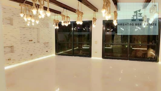 Villa for rent in Patio Al Zahraa Compound in Sheikh Zayed with kitchen and air conditioning, private garden, 4 bedrooms, 5 bathrooms, and a large reception.
