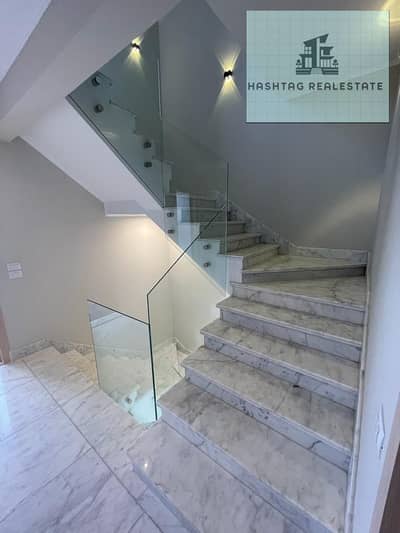 Villa for rent ultra super lux in Compound Patio Al Zahraa Sheikh Zayed with kitchen and air conditioning with private garden and 4 rooms and 5 bathrooms and a large reception