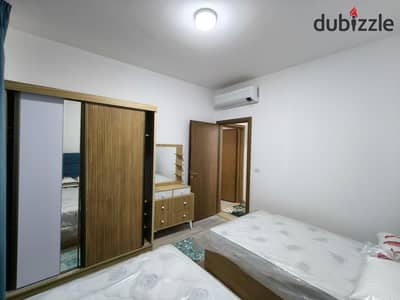 Luxury apartment for rent in Brevada, Madinaty. Two bedrooms, two bathrooms, a kitchen, and an excellent reception finishing and furnishing. 35,000 required, viewing at any time.
