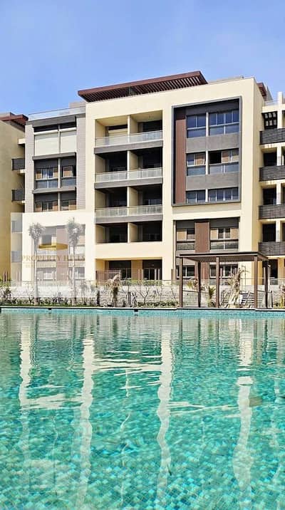 A stunning apartment ready for immediate delivery with a direct view of the pool next to the American University and 90th Street