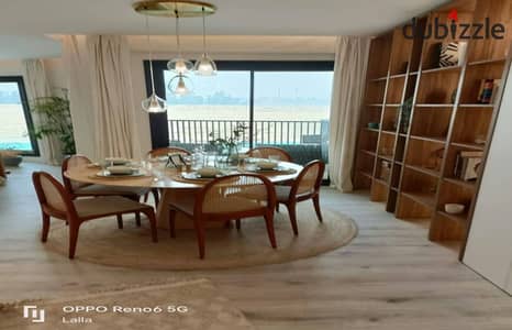 Fully finished apartment for sale in Talalah Compound, next to SODIC and New Giza compounds, with installments up to 15 years