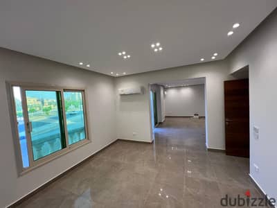 Apartment for rent—including kitchen, air conditioning units, and appliances—located next to the American University (AUC) and near Point 90 Mall on S