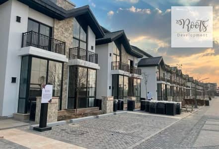 For Sale Townhouse Prime Location with Open View Delivery After one Year in The Wounder MarQ in Mostakbal city