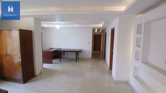 Located on Wadi El Nil Street, 60 sq m (modern building), air-conditioned and partially furnished.