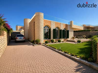 A distinctive, fully furnished chalet for sale with a sea view in the heart of the North Coast | El Alamein - Chalet for Sale