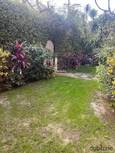 Opportunity for lovers of the ground in the garden, an apartment for sale in Al-Rehab 1