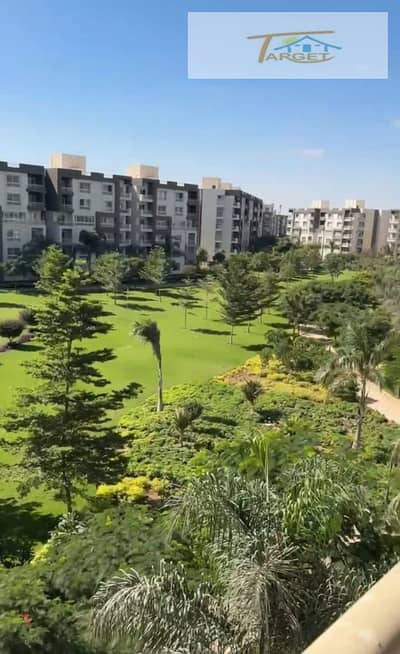 Apartment for sale in Madinaty, 204 sqm, located in B14, Group 141, with a wide garden view; 2023 booking.