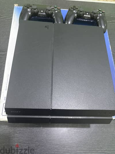 PS4 1TB Used like new +2 controllers original+ call of duty game cd