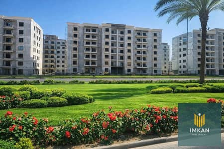 An apartment is available for sale in the Mayan Compound, Al Shorouk, at an attractive price. It comes fully finished and offers a view of expansive