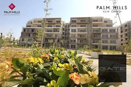 Apartment for sale, lowest price, ground floor with garden, fully finished, in Palm Hills New Cairo
